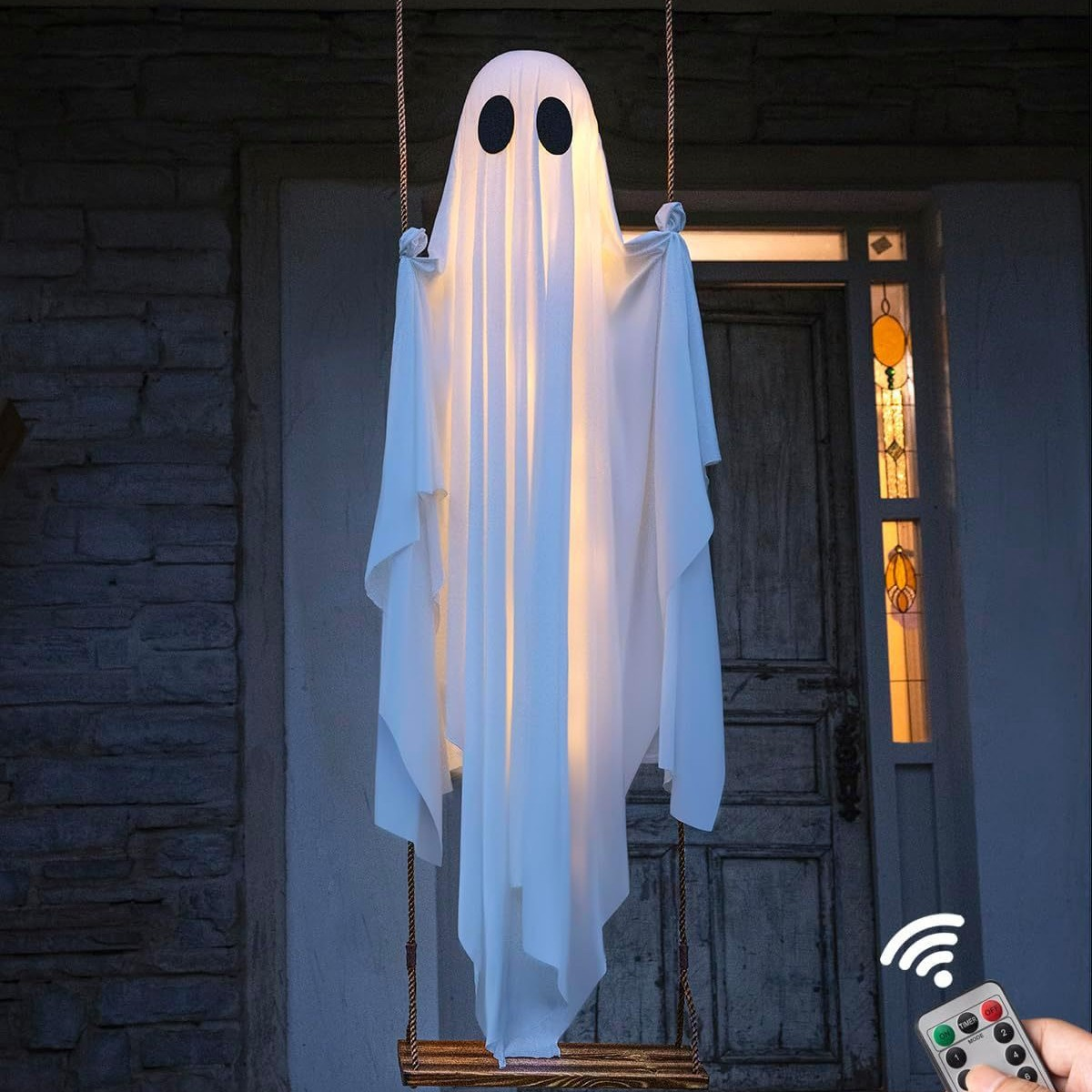 Remote controls displayed beside a glowing swing ghost